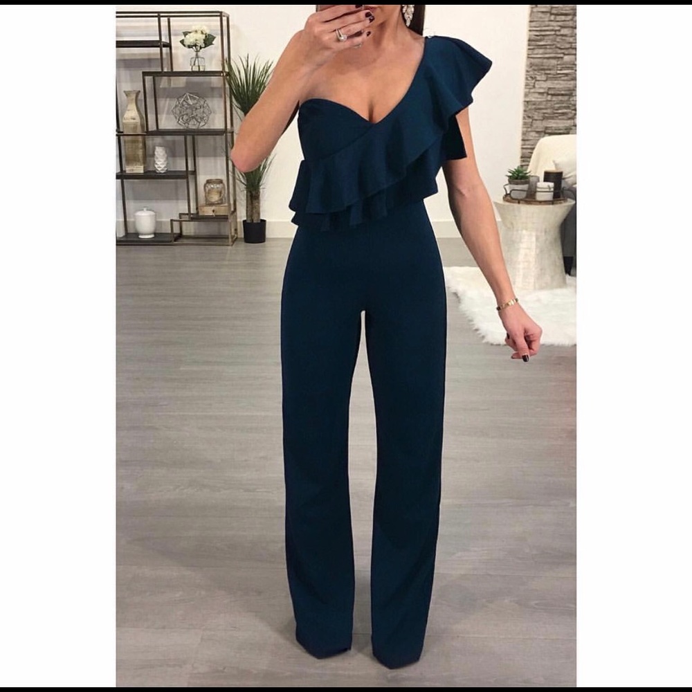 Woman’s jumpsuit in teal. Size small